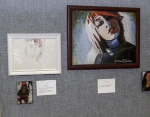 One of the panels in the show is devoted to a self portrait by Lisa D'Agostino, lost to suicide in 2012, and her mother Cathy's portrait in remembrance of Lisa. / Photo by Cliff Roles
