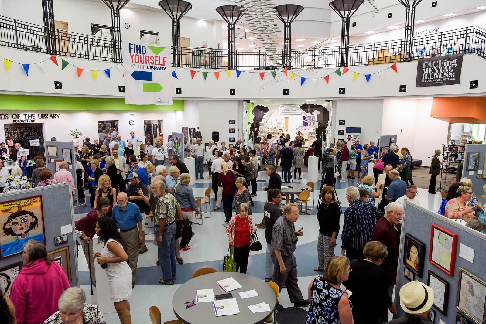 The rotunda of the Selby Library during the opening reception of the FACEing Mental Illness art show. / Photo by Cliff Roles